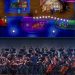 Musicians rehearsing for Stardew Valley Symphony under ConcernedApe's direction